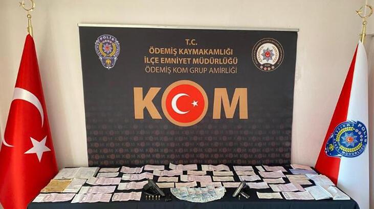 İzmir’de tefecilik yaptığı şüphesiyle 2 kişi gözaltına alındı